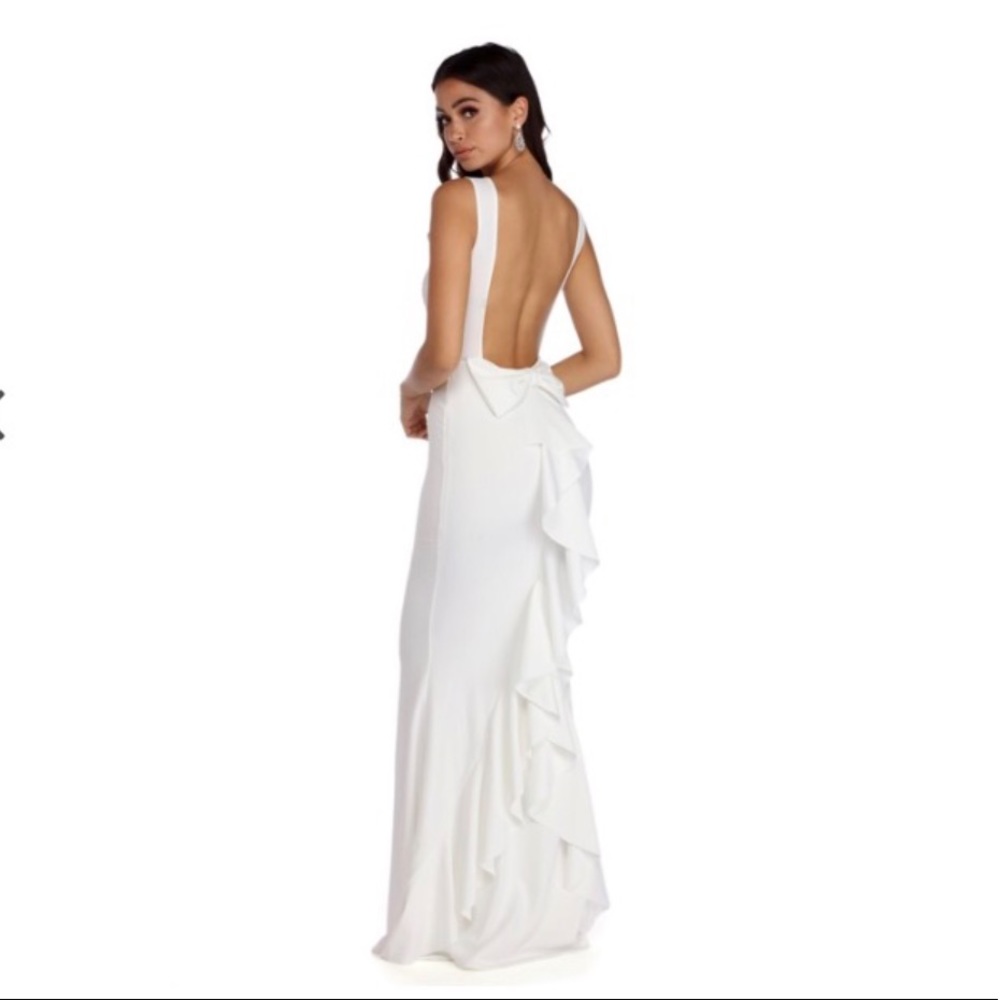 New with tags. Floor length prom dress in white.